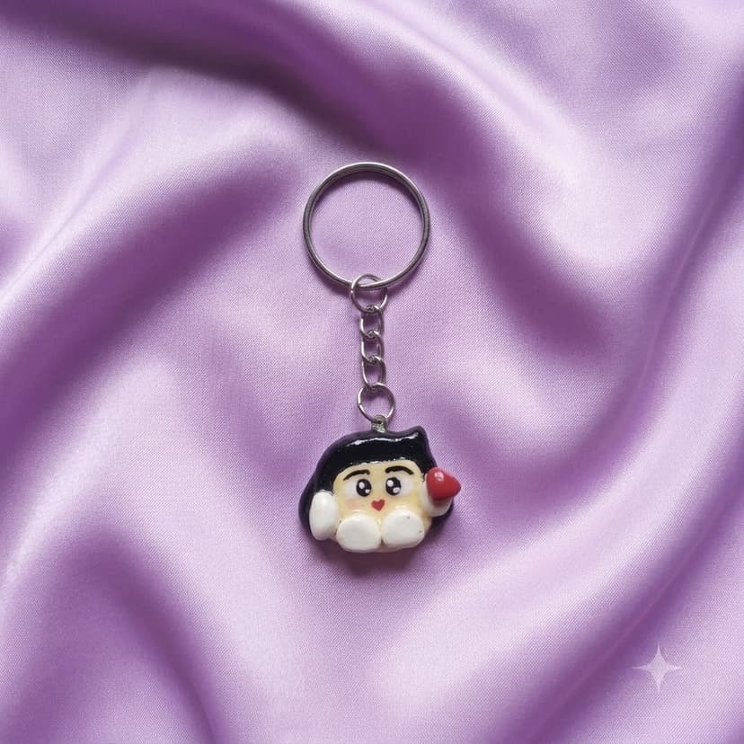 Lumi Pocket Charm_ keychain in lavender, front view